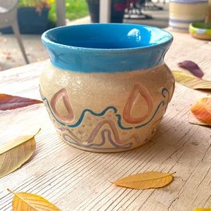 Hand carved stoneware vase